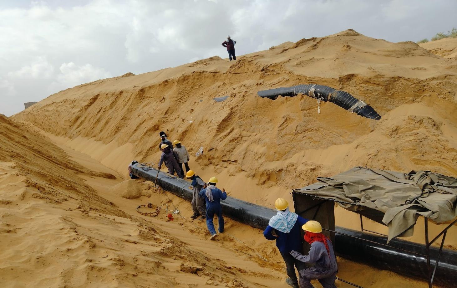 Marvel Engineering field team working on pipeline installation in the desert